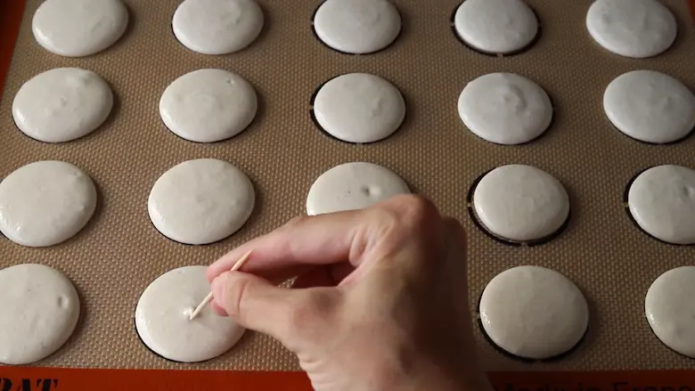 removing air bubbles from Salted Caramel Macarons