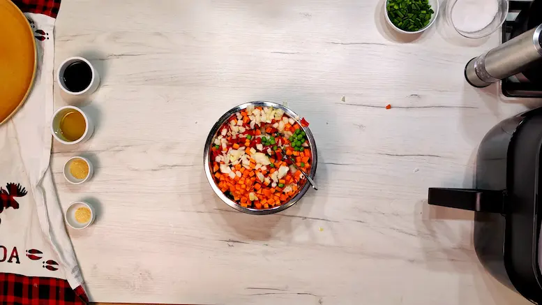 mix veggies into the bowl - Air Fryer Fried Rice