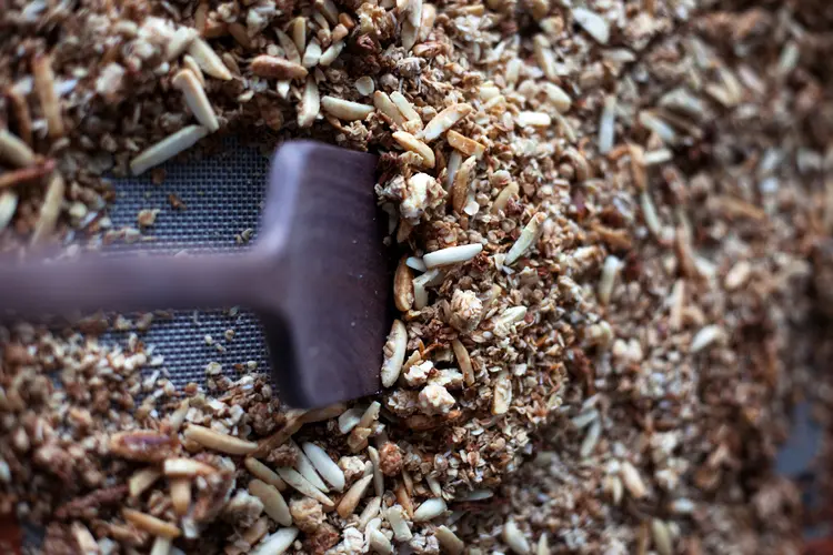 mixing ingredients of Almond Coconut Chocolate Granola