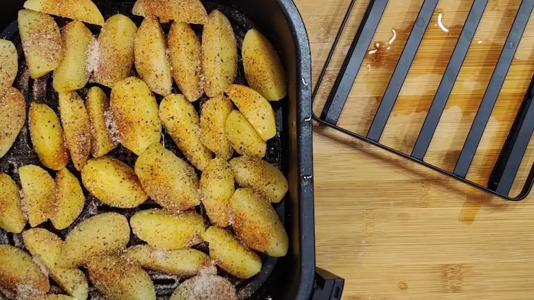 sprinkle oil and seasoning at baby potatoes before air frying