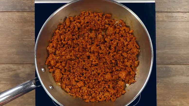 cooking ground beef for making Dorito Taco Salad