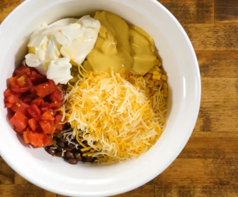 mixing ingredients for Doritos Chicken Casserole