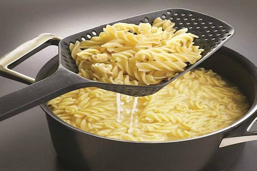 Draining Pasta using slotted or spider spoon